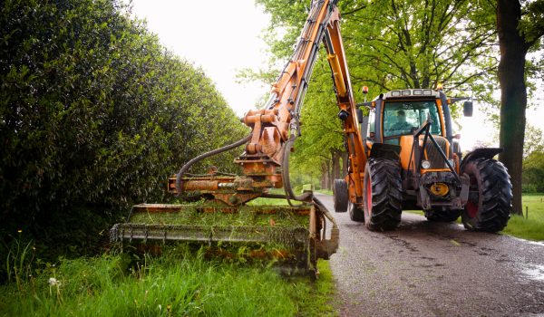 mowing grass shoulder mowing grass shoulder with tractor